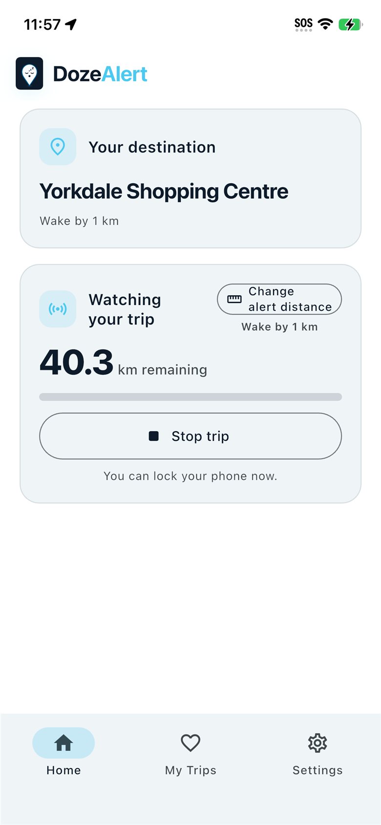 iPhone watching a map-pin trip with kilometers remaining.